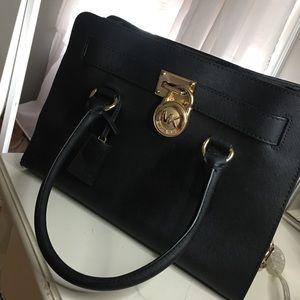 Black MK bag with gold hardware